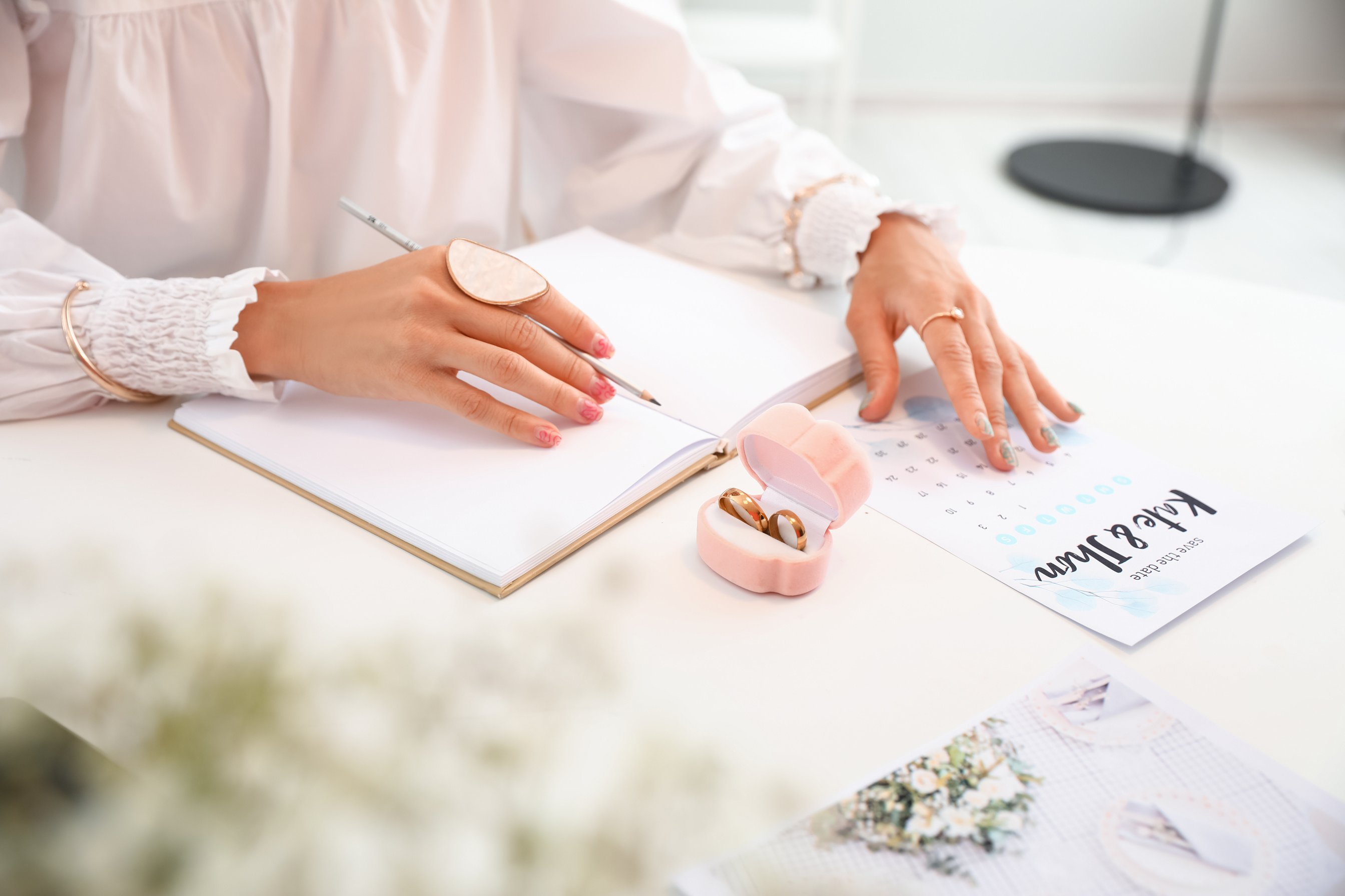 Female Wedding Planner Working in Office